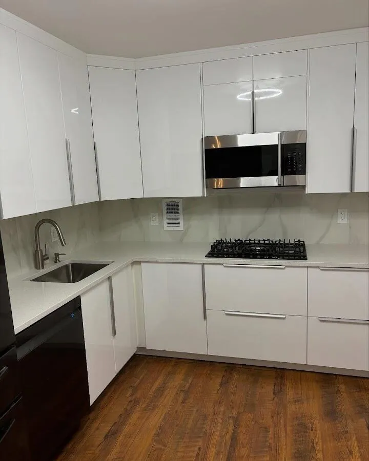 Restored kitchen with white cabinets after water damage in Danbury